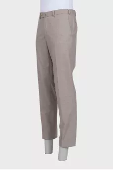 Men's gray trousers with creases, zippers and buttons