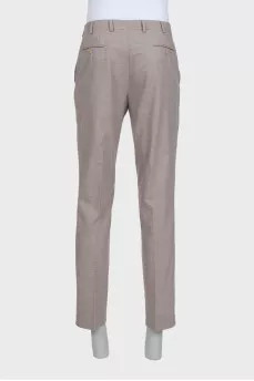 Men's gray trousers with creases, zippers and buttons