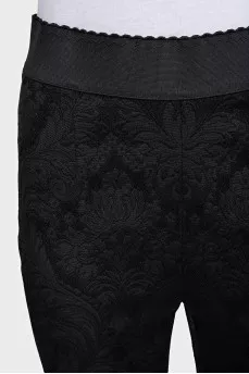Tapered trousers with a pattern and tag