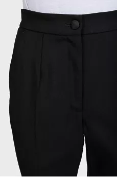 Black wool trousers with tag