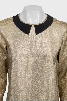 A straight cut gold dress