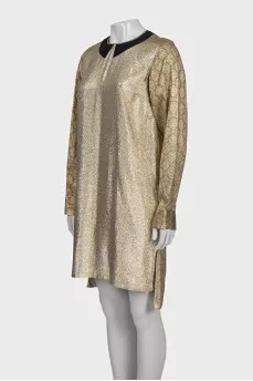 A straight cut gold dress