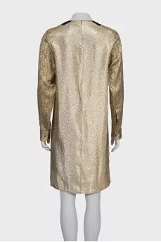 A straight cut gold dress