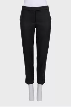 Black cuffed trousers with tag