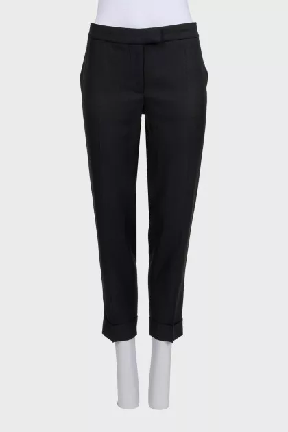 Black cuffed trousers with tag