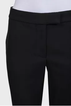 Black cuffed trousers with tag