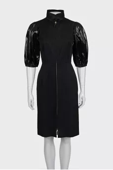 Black dress with puff sleeves and a zipper