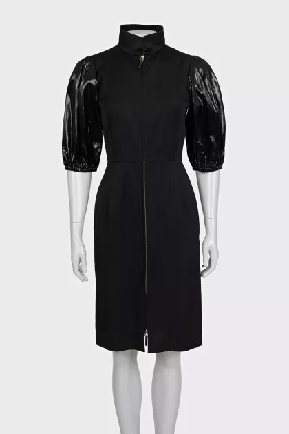 Black dress with puff sleeves and a zipper