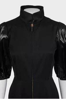 Black dress with puff sleeves and a zipper