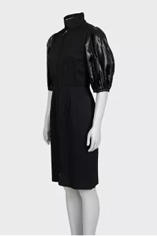 Black dress with puff sleeves and a zipper