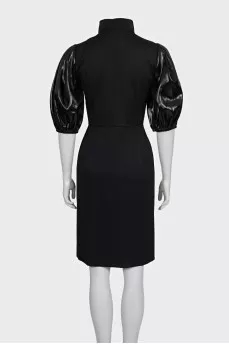 Black dress with puff sleeves and a zipper