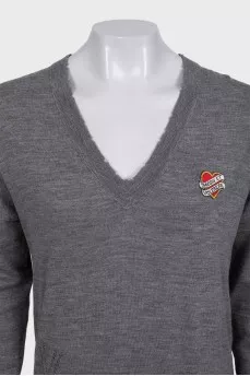 Gray wool jumper with a patch