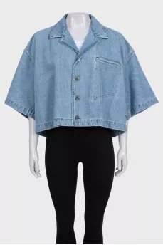 Blue denim jacket with tag