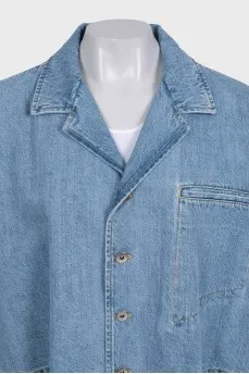 Blue denim jacket with tag