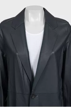 Dark blue leather trench coat with tag