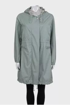 Light green cloak with a hood and pockets