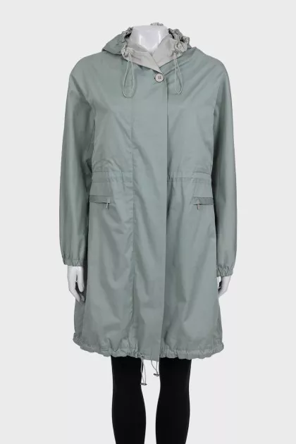 Light green cloak with a hood and pockets