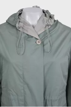 Light green cloak with a hood and pockets