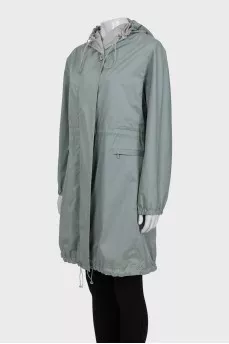 Light green cloak with a hood and pockets