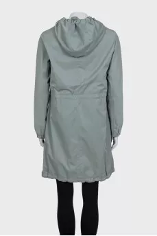 Light green cloak with a hood and pockets