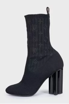 Fabric ankle boots with a figured heel and no fastening