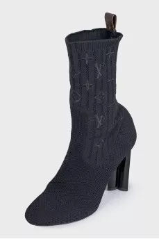 Fabric ankle boots with a figured heel and no fastening