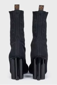 Fabric ankle boots with a figured heel and no fastening