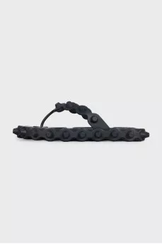 Black flip-flops with a chunky sole