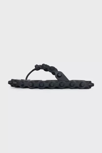 Black flip-flops with a chunky sole