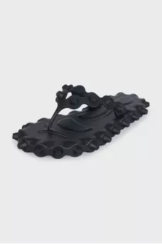 Black flip-flops with a chunky sole