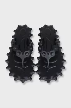 Black flip-flops with a chunky sole