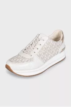 Beige sneakers with a signature print