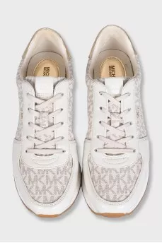 Beige sneakers with a signature print