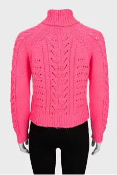 Pink sweater with perforations