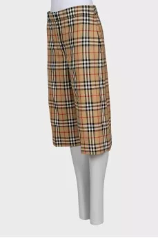 Long wool shorts with signature print