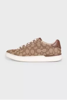 Brown textile sneakers with a signature print
