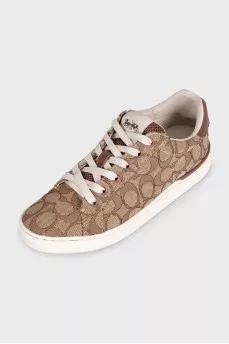 Brown textile sneakers with a signature print