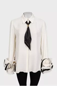 Beige blouse with ruffled sleeves