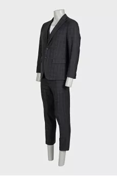Men's three-piece suit in a checkered print
