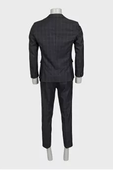 Men's three-piece suit in a checkered print