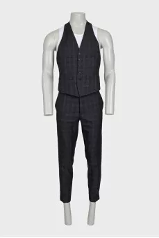 Men's three-piece suit in a checkered print