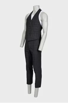 Men's three-piece suit in a checkered print