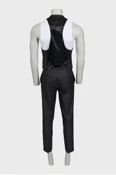 Men's three-piece suit in a checkered print