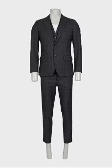Men's three-piece suit in a checkered print