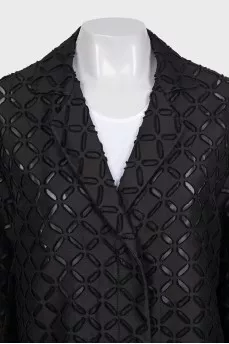 Perforated suit consisting of a jacket and shorts