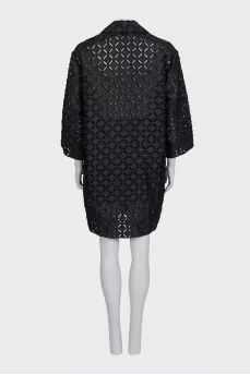 Perforated suit consisting of a jacket and shorts