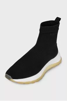 Black textile sneakers with a white sole