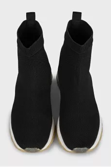 Black textile sneakers with a white sole