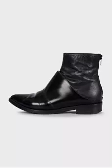 Black leather pointed toe boots