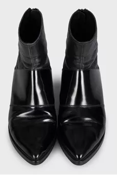 Black leather pointed toe boots